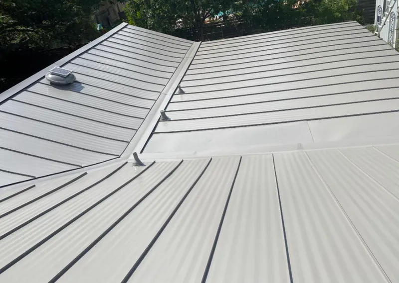 Solar attic fan installed on a metal roof for Roof Ventilation in Mount Washington
