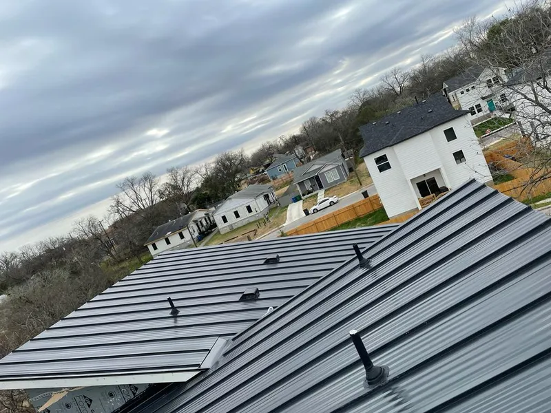 Standing seam metal roof panels with vents for Skylight Repair in Mount Washington